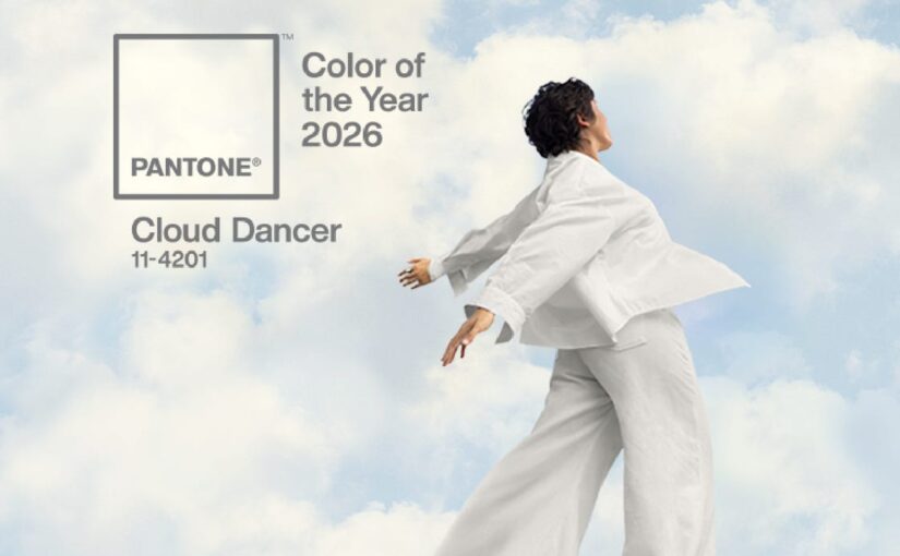 A swatch of Cloud Dancer, Pantone's 2026 Color of the Year with a woman in white clothes standing against a backdrop of clouds